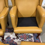 Pair of 1980s English wingback armchairs in leather.