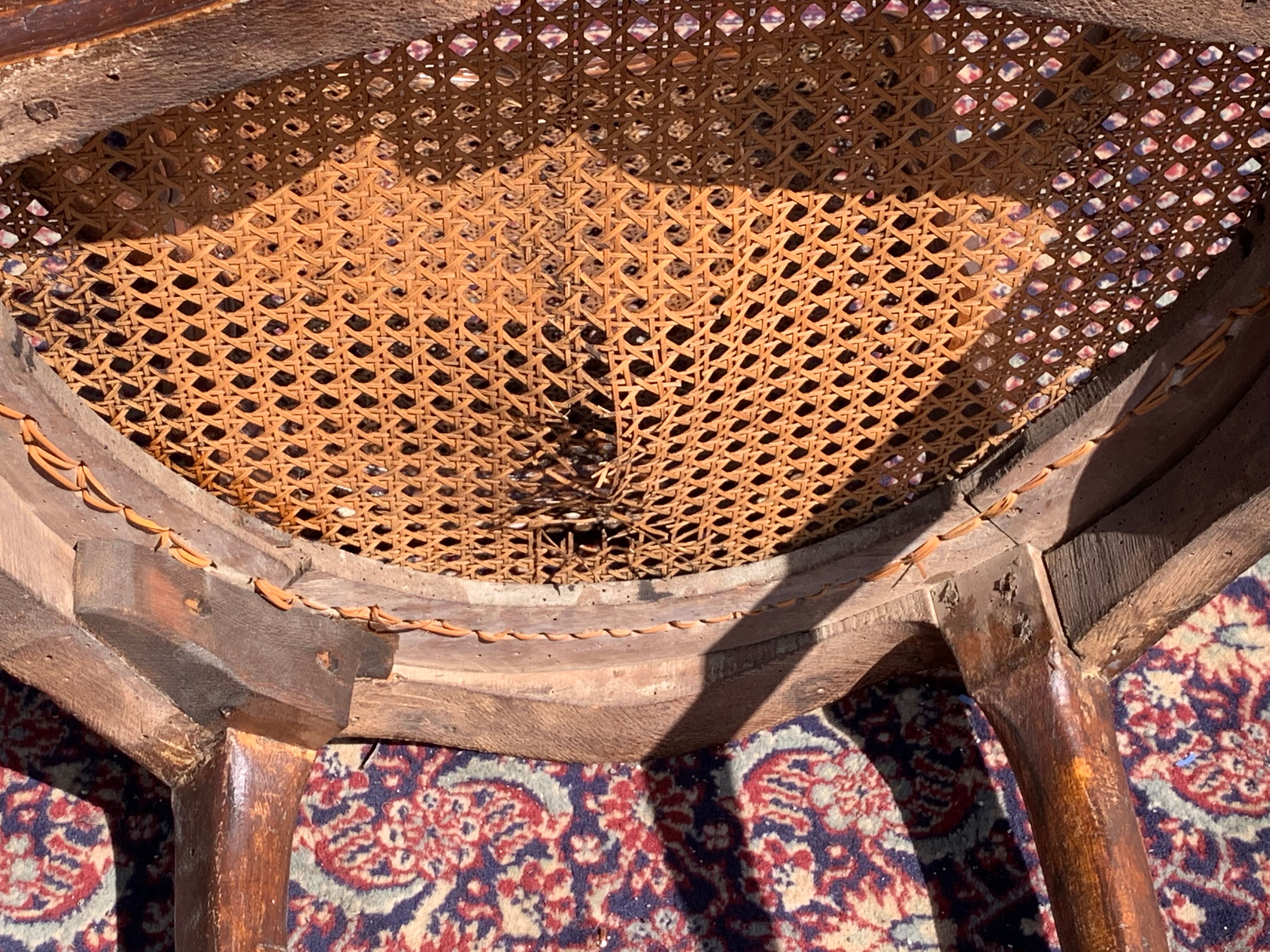 Pair of caned convertible armchairs Louis XV period