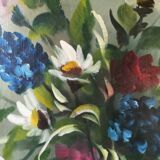 Still life with daisies and flowers in vase