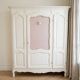 Baroque 3-door wardrobe repainted in white.