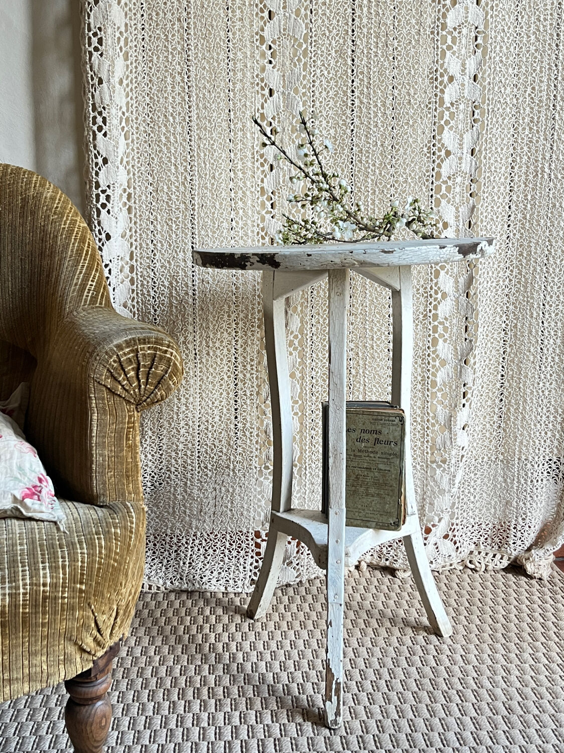 Small side table with an antique finish