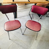 Pair of raspberry-colored chairs from the 60s/70s with metal legs