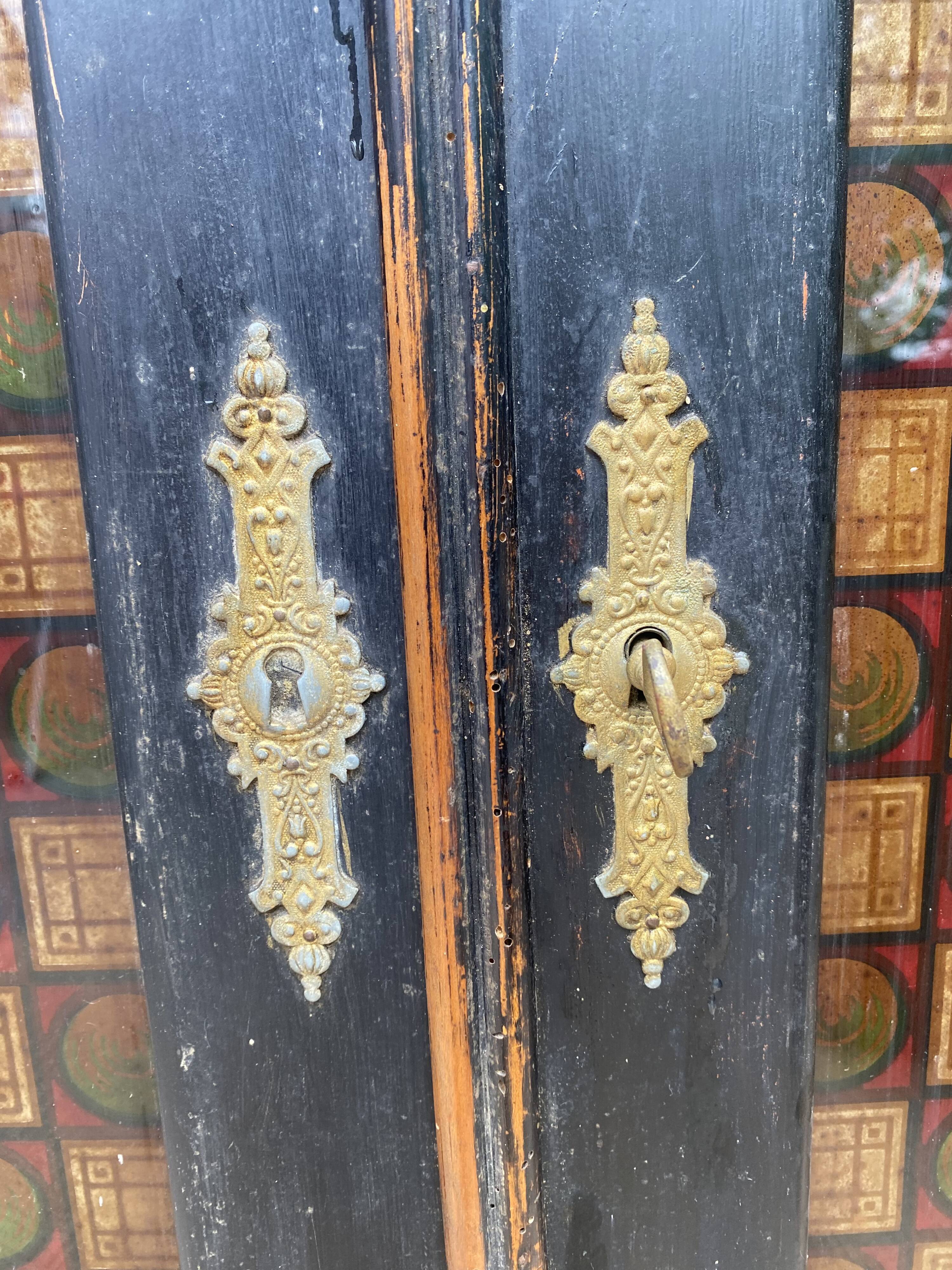 Double wood and glass closet doors