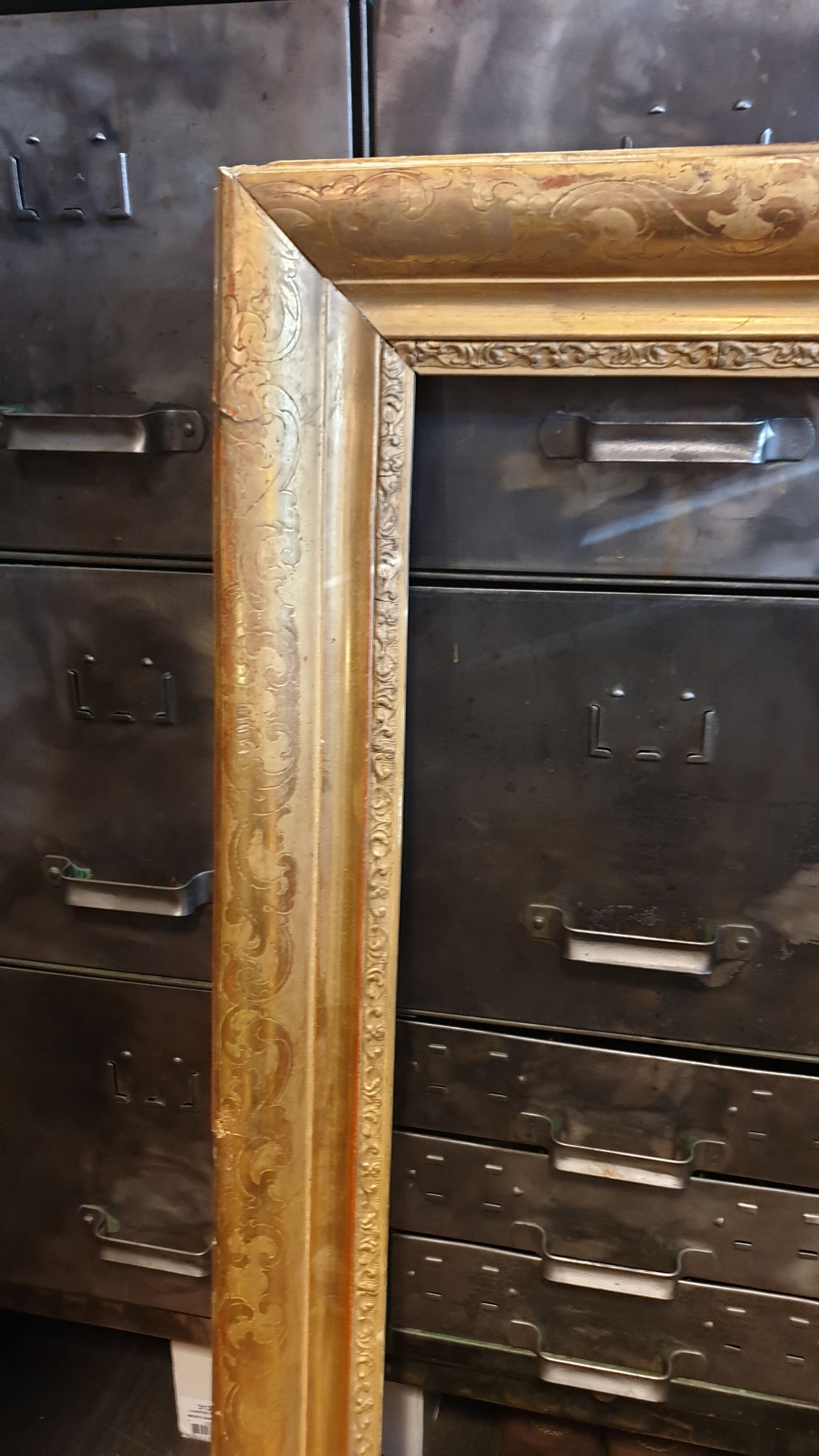 Nineteenth wood frame and gilded stucco