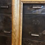 Nineteenth wood frame and gilded stucco