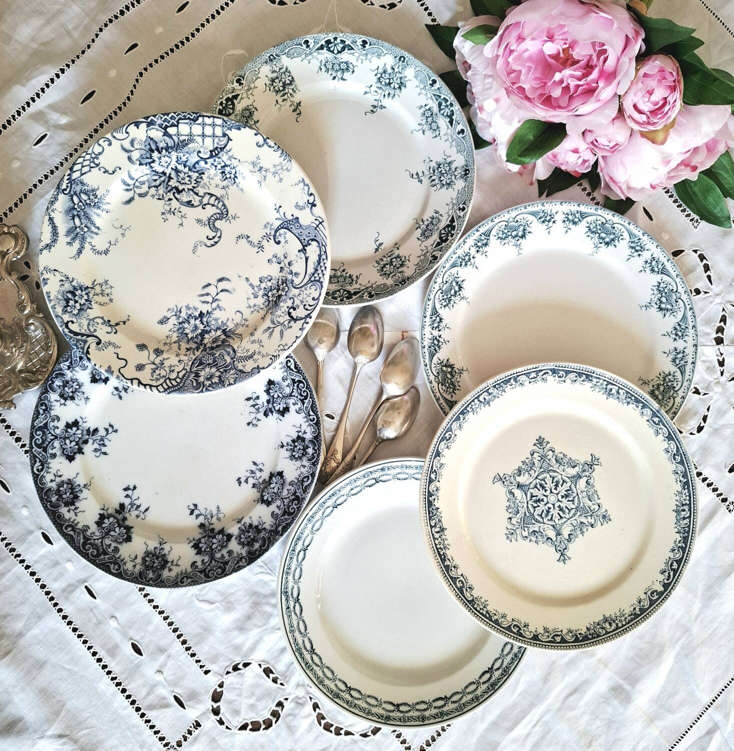 Antique earthenware dessert plates accompanied by a dish