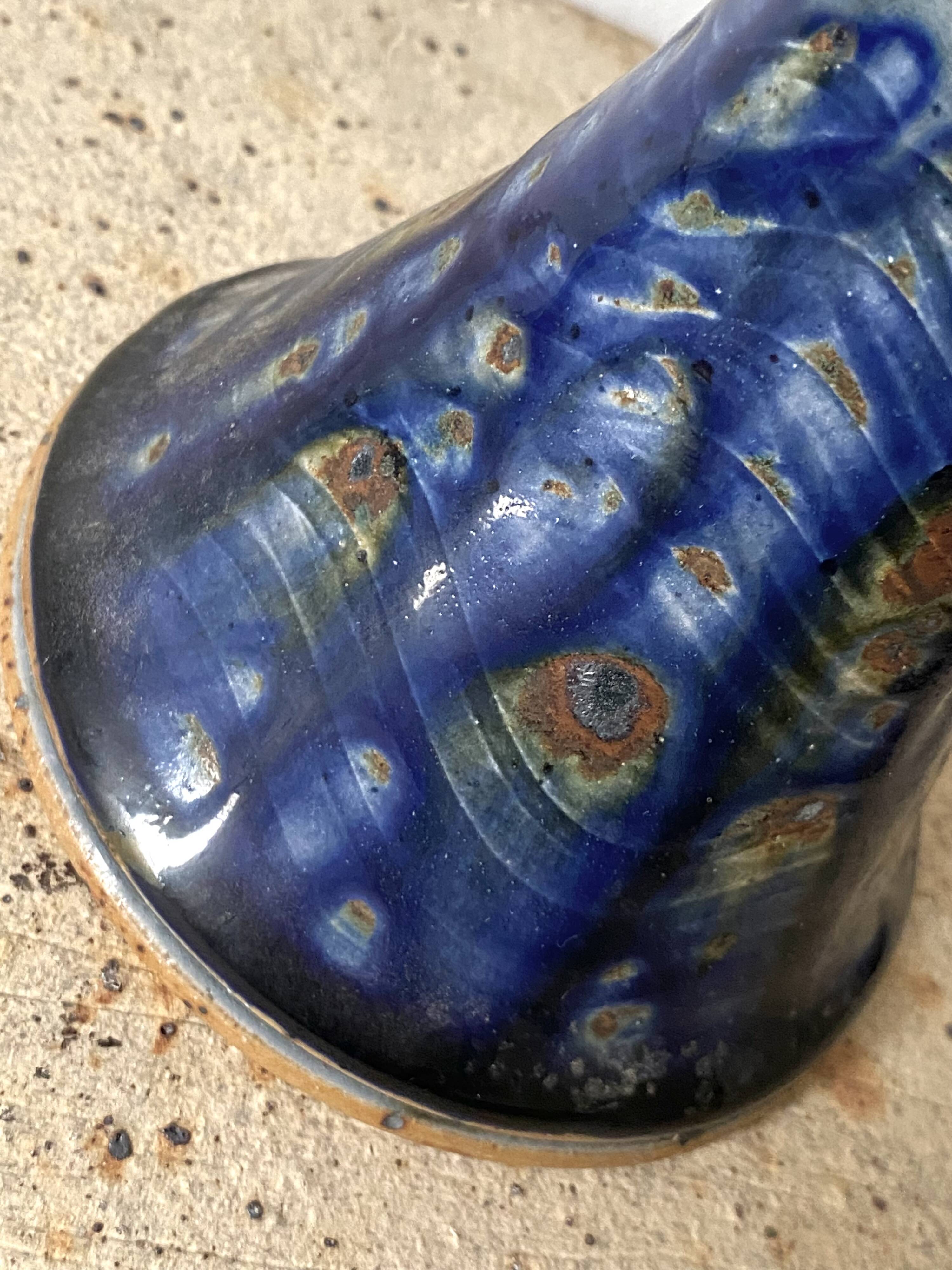 Anthropomorphic ceramic candlestick