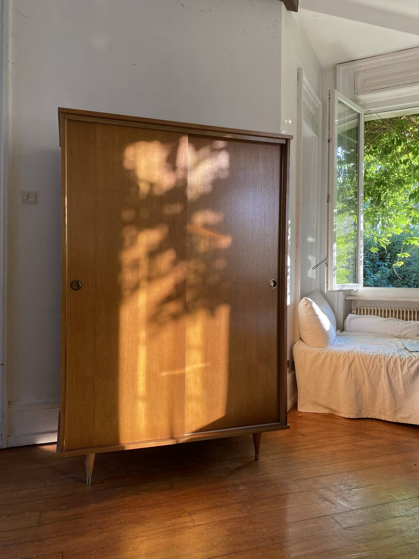 Large vintage Scandinavian wardrobe with two sliding doors.