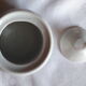 Set of 4 small covered pots in white porcelain