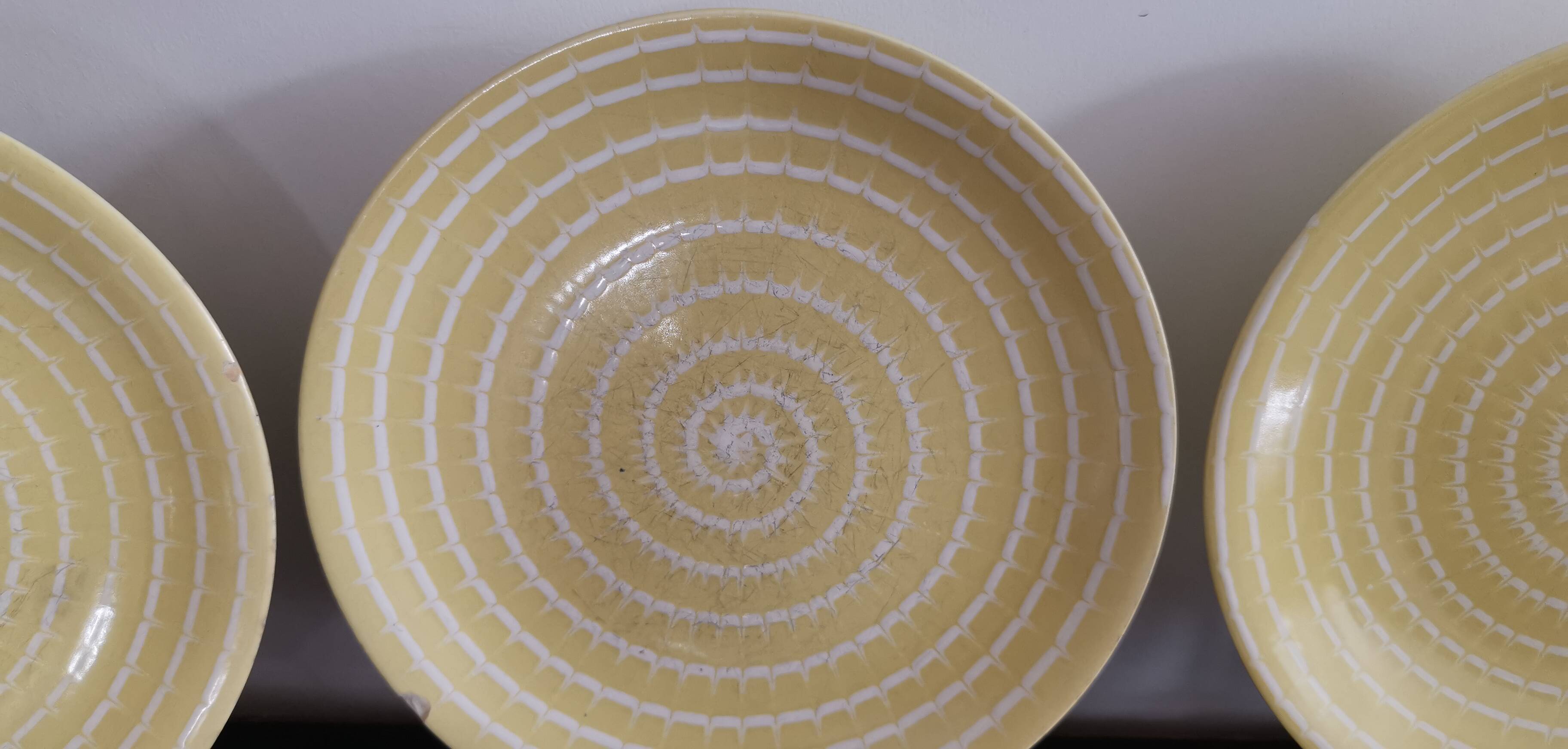 Set of 5 old Longchamp sunny yellow flat plates