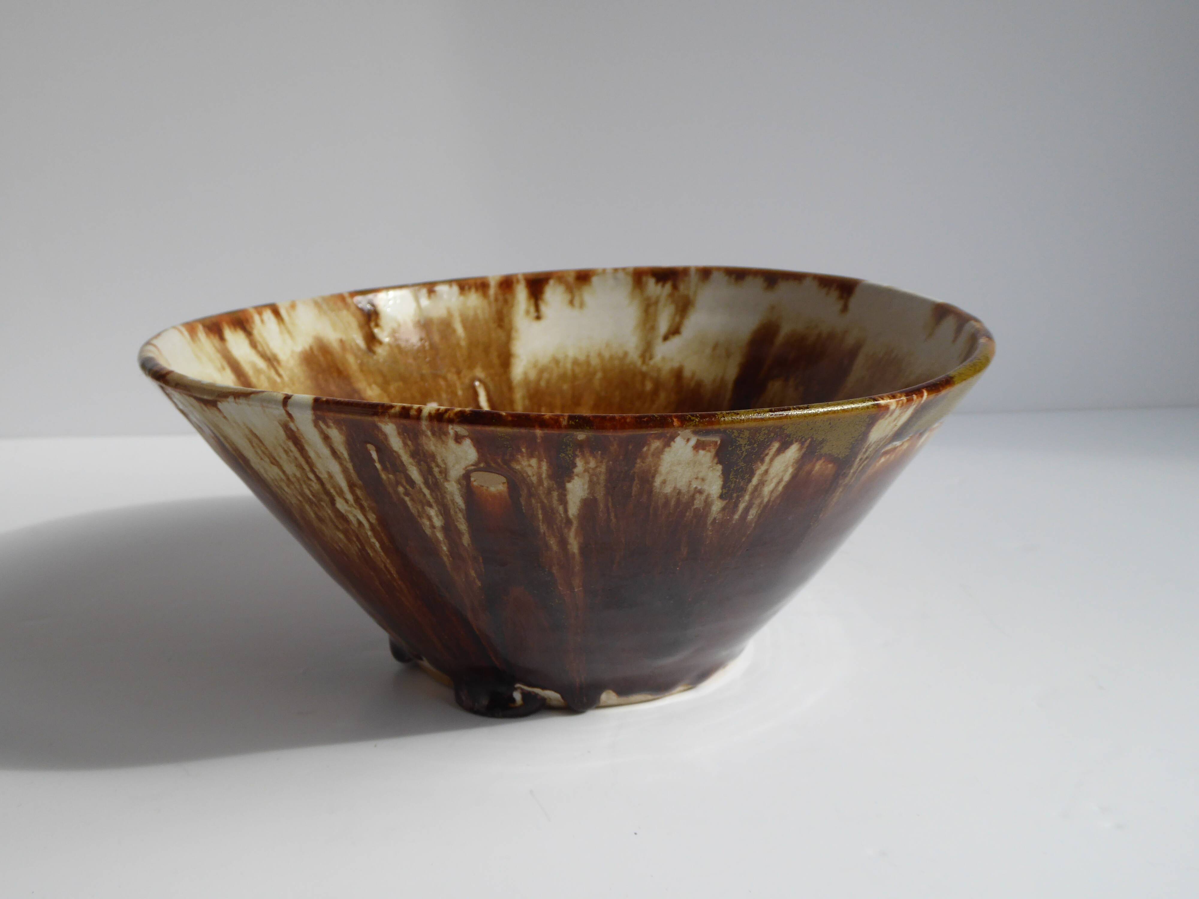 Enamelled terracotta cup