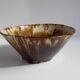 Enamelled terracotta cup