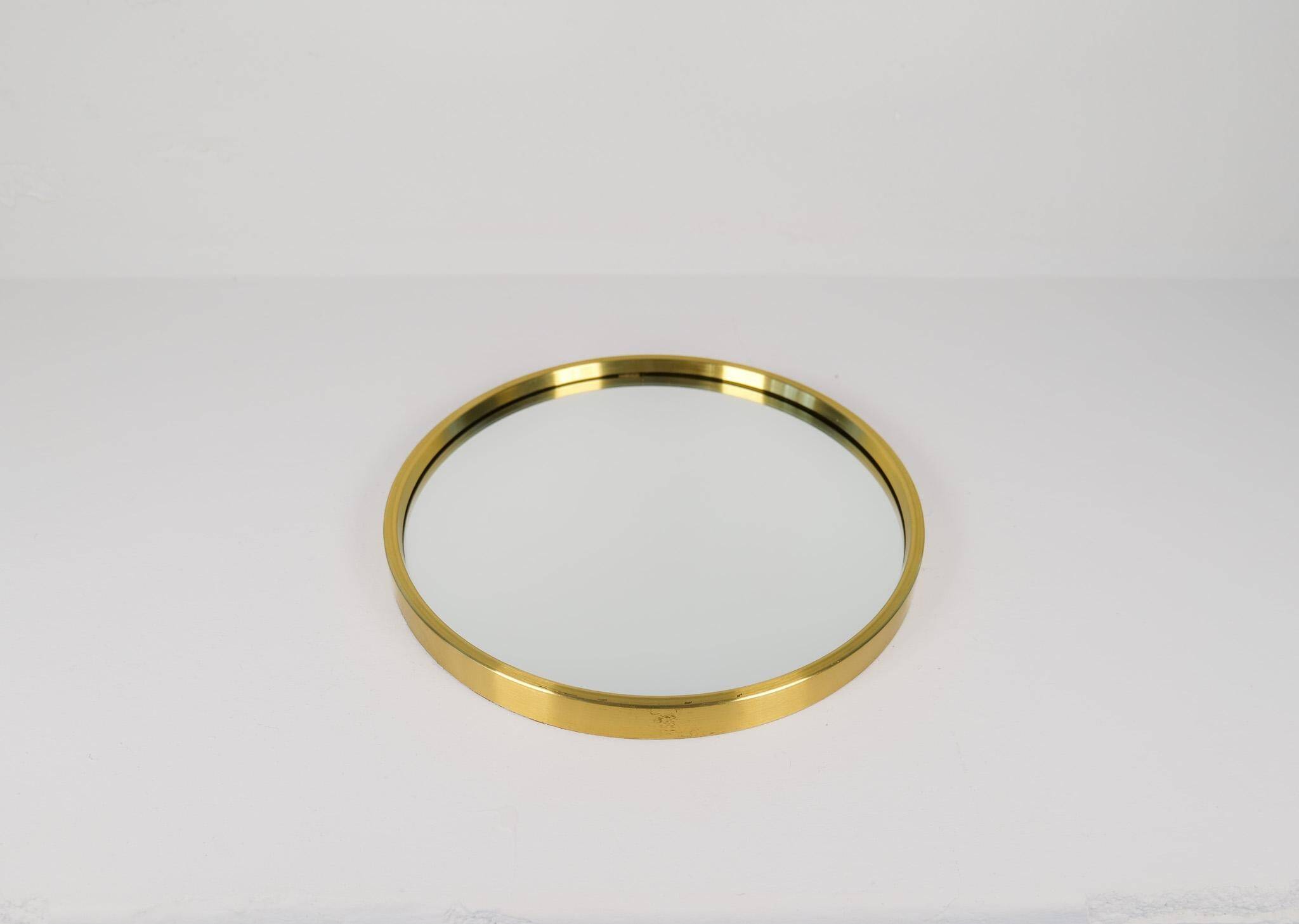 Modern brass mirror from the mid-century by Glasmäster in Markaryd, Sweden, 1960s.