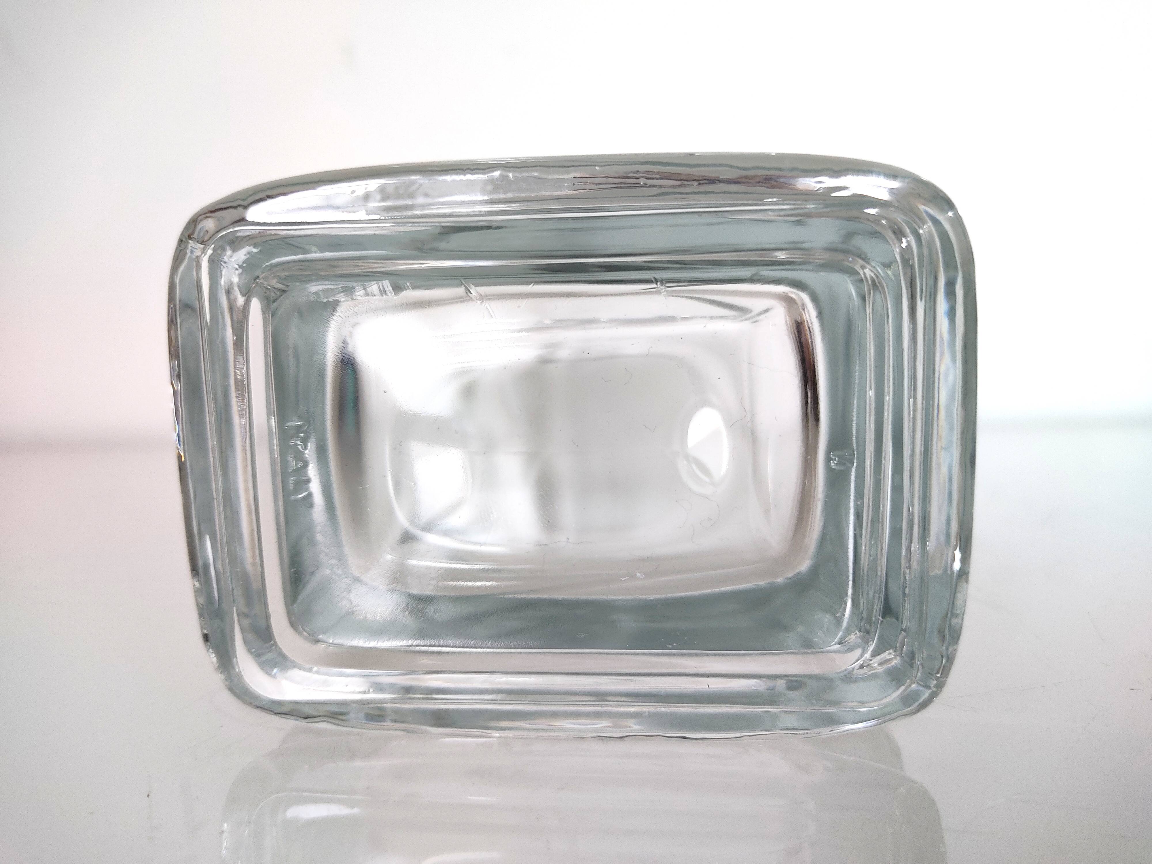 Glass vase with metal flower application