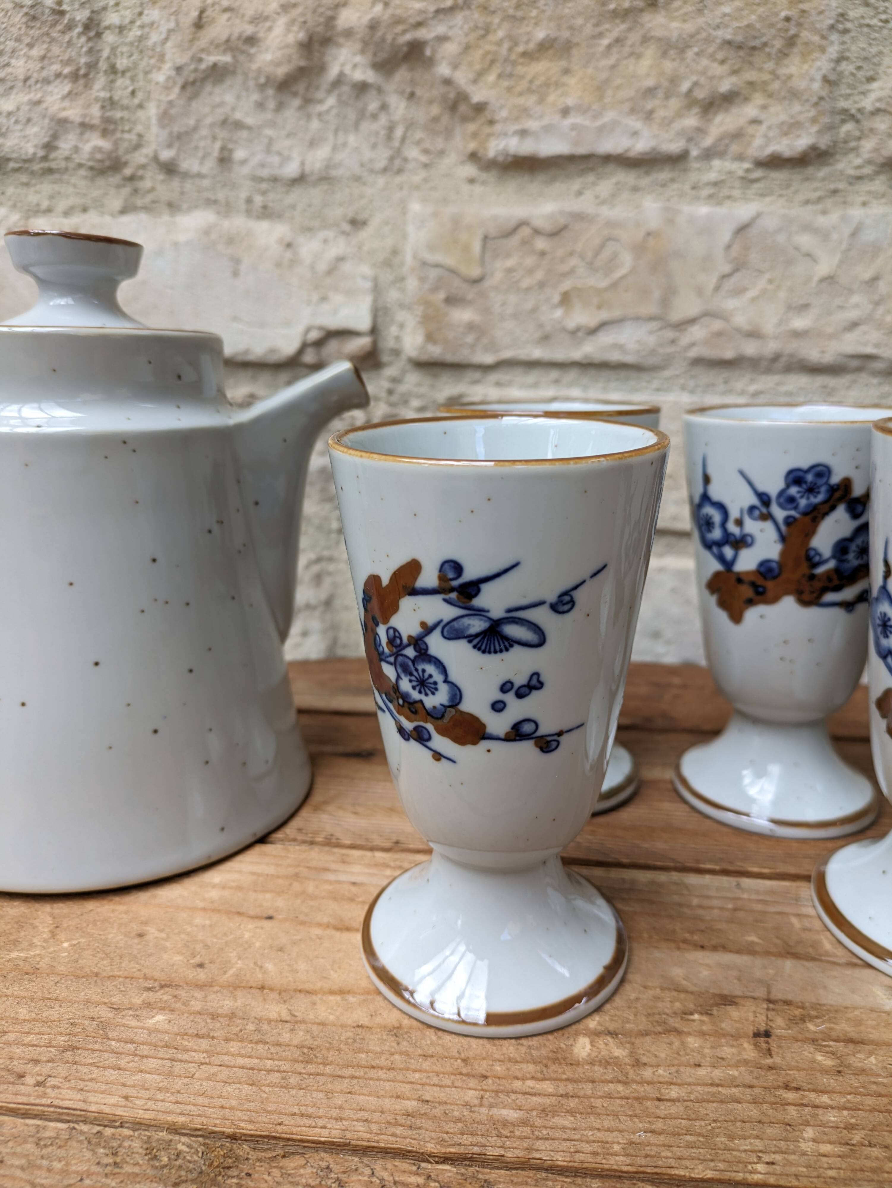 Old coffee service with 6 mazagrans and coffee pot with blue floral decoration
