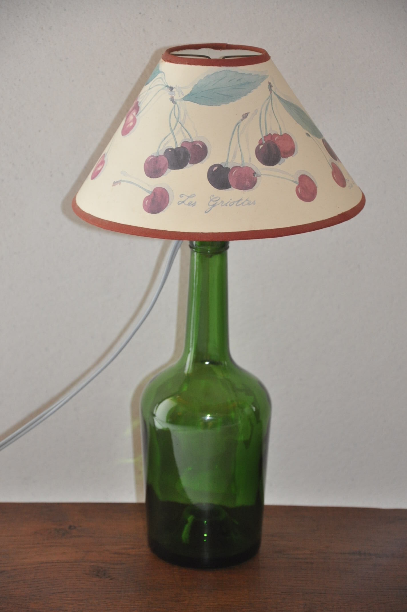 Lampe bouteille en verre vert
