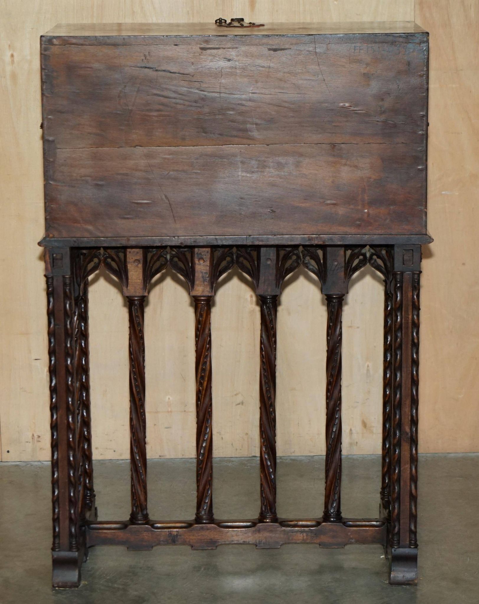 18th-century carved Spanish cabinet with hidden storage.