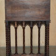 18th-century carved Spanish cabinet with hidden storage.