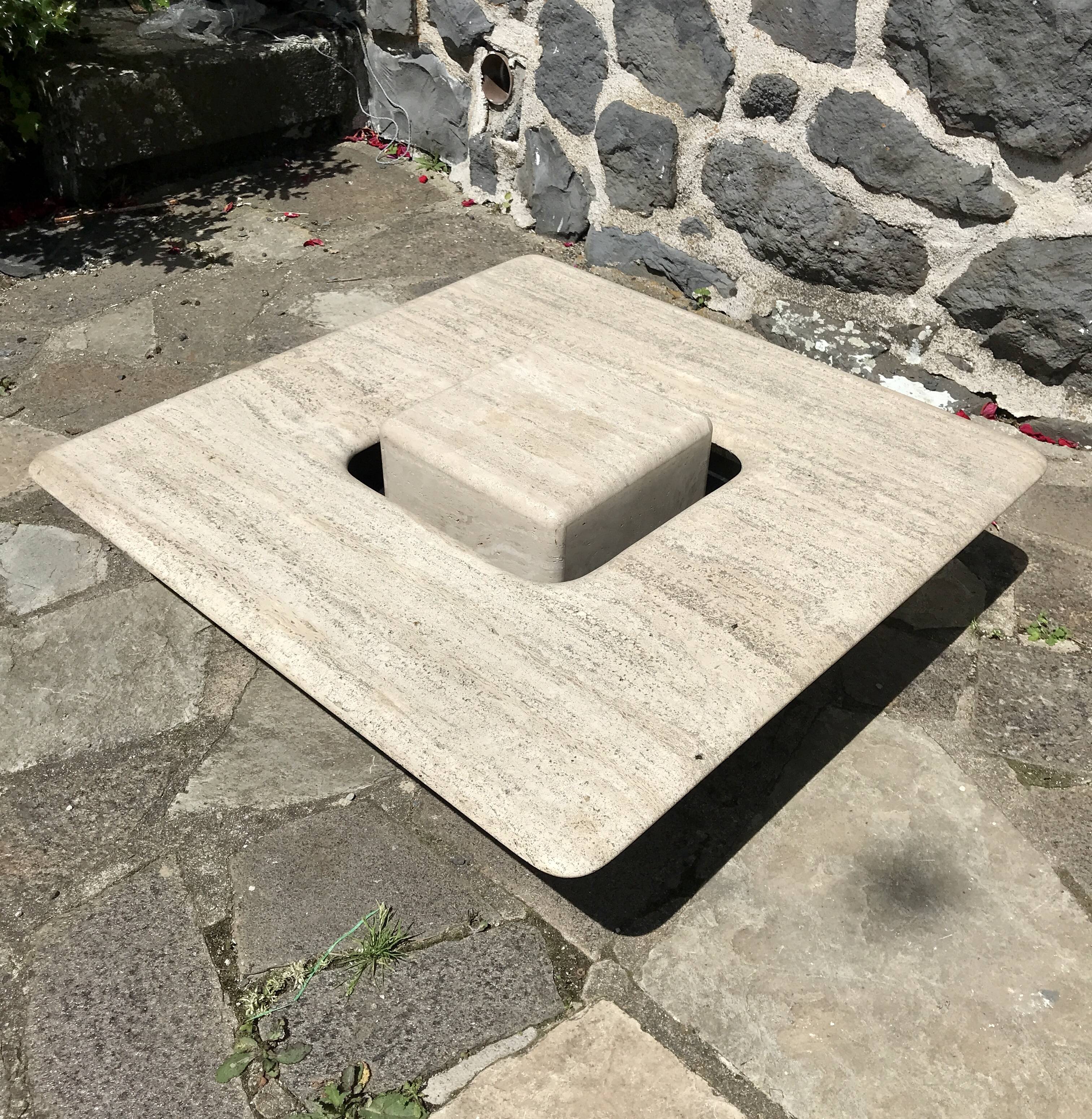 Sculptural travertine coffee table