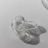 Vintage pressed glass carafe from the 1960s, clear sculptural glass with textured patterns and a stopper.