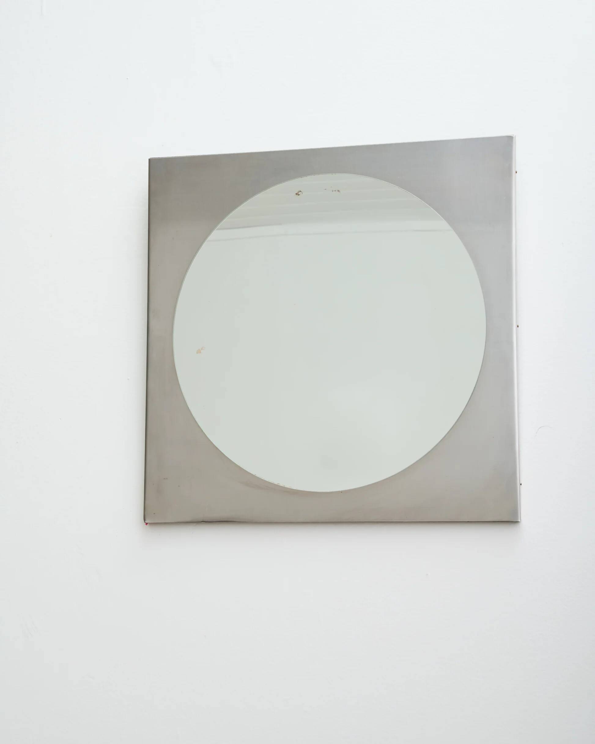 Round mirror with a square brushed aluminium frame, 1970-1980.