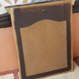 Black mirror and raw natural wood