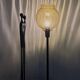 Table lamp with an antique gold glass lampshade