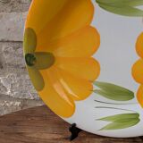 Round serving dish with hand-painted yellow flowers in ceramic TC Italy.