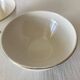 Pair of small faceted bowls with cow illustrations from the 40s and 50s