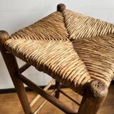 Low wooden and straw stool