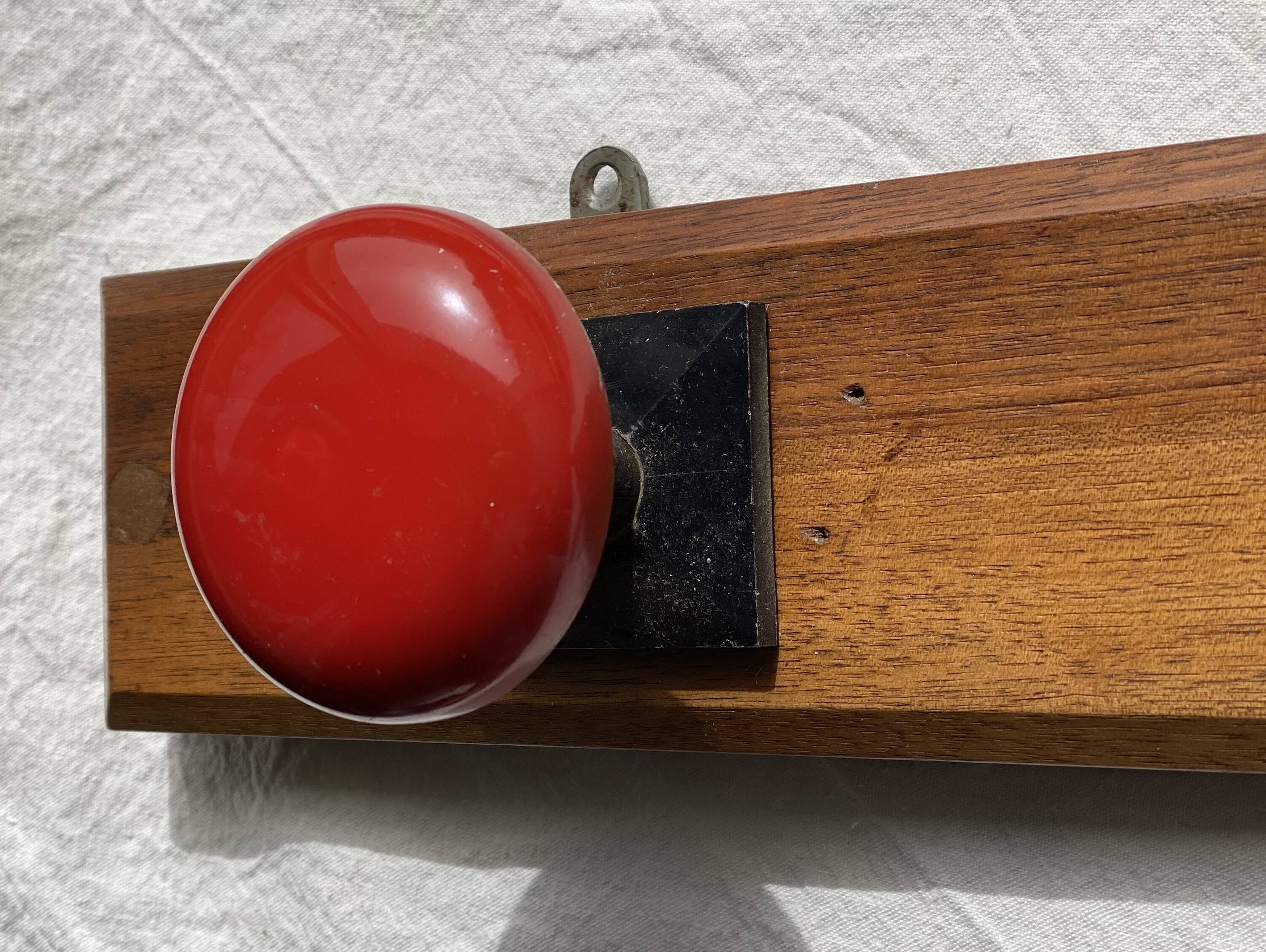 Wall-mounted coat rack with 3 hooks, vintage 1960s red lacquered metal.