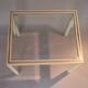 White lacquered side table by Pierre Vandel with gold brass.