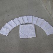 Tablecloth and its twelve monogrammed towels.