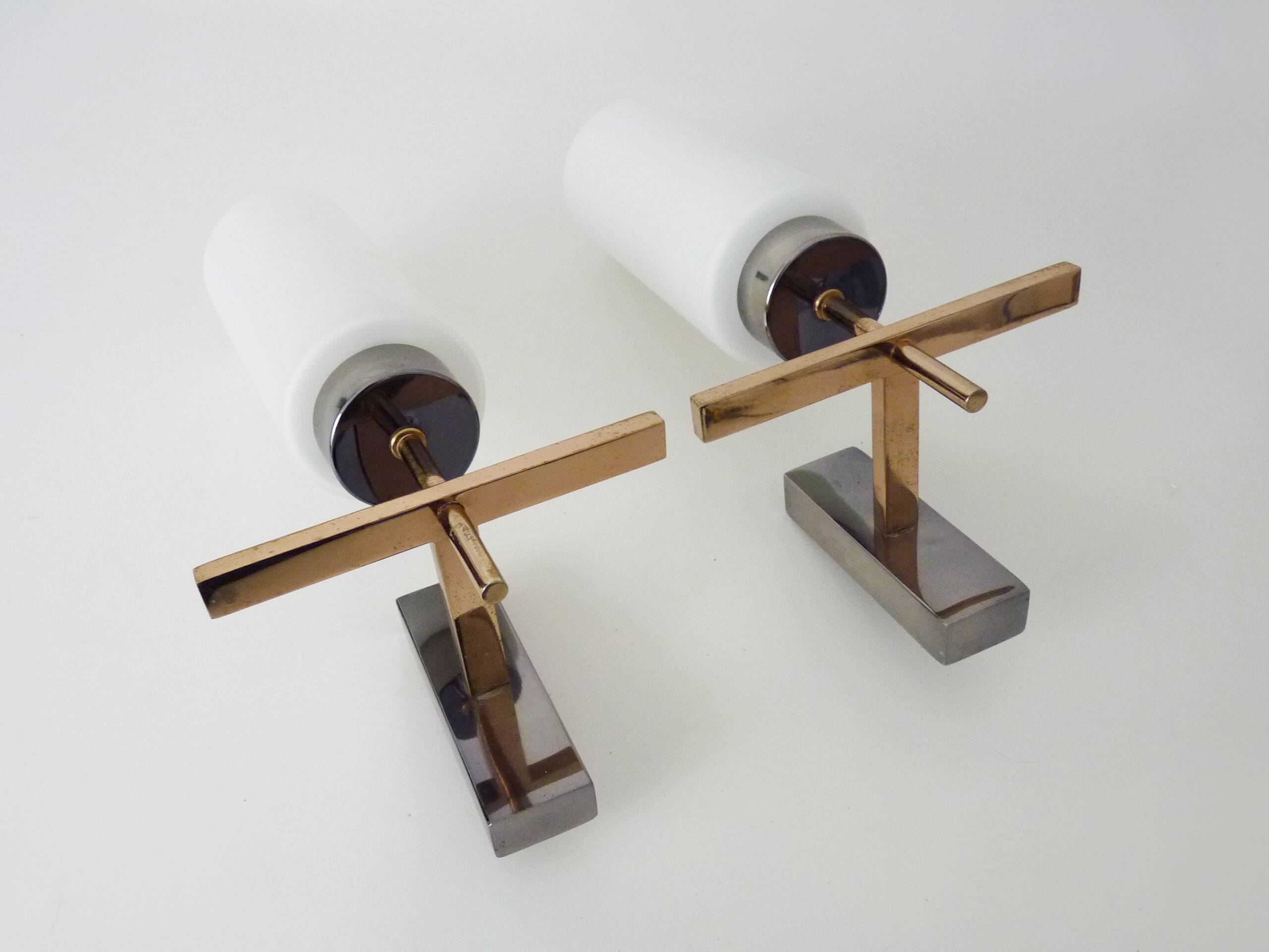 Pair of chrome-plated metal and opaline brass wall lights. 1960s