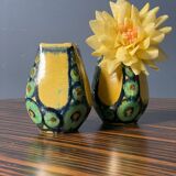 A pair of green and yellow vases