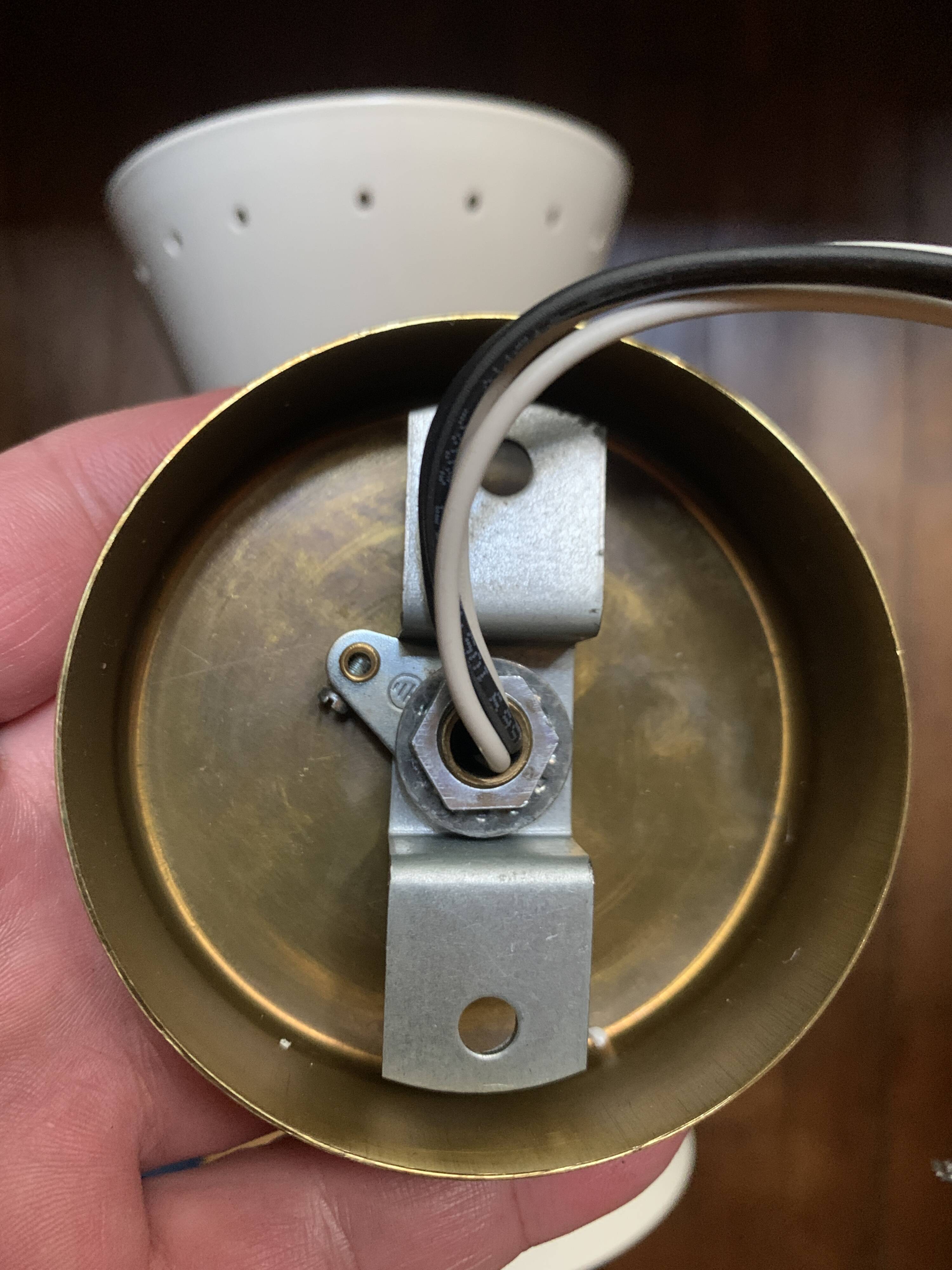 Pair of black Italian diabolo wall lights.