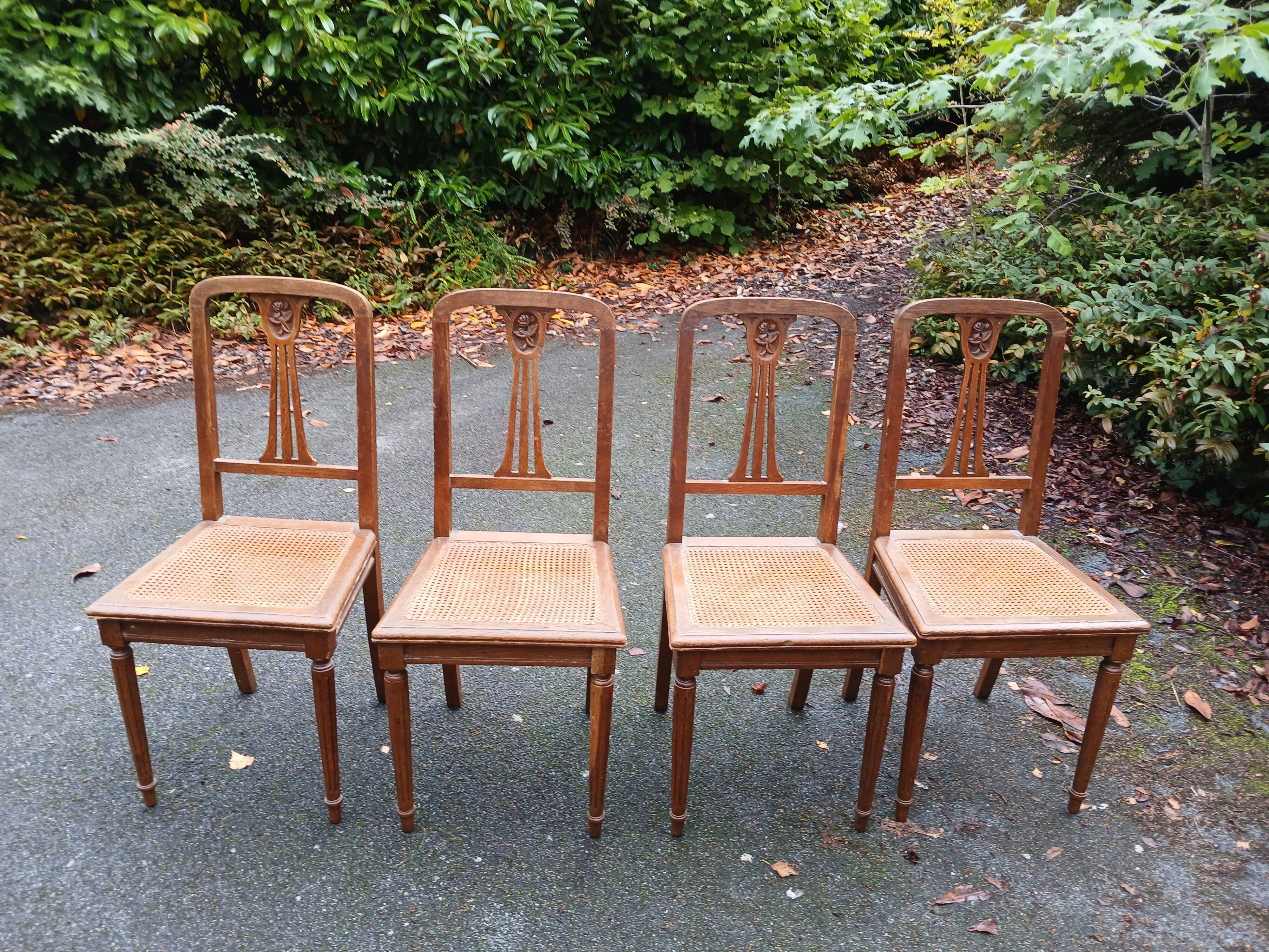 4 old wooden cane chairs