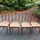 4 old wooden cane chairs