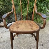 Baumann curved caned wood armchair, 1900