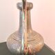 Oriental teapot made of crafted silver metal