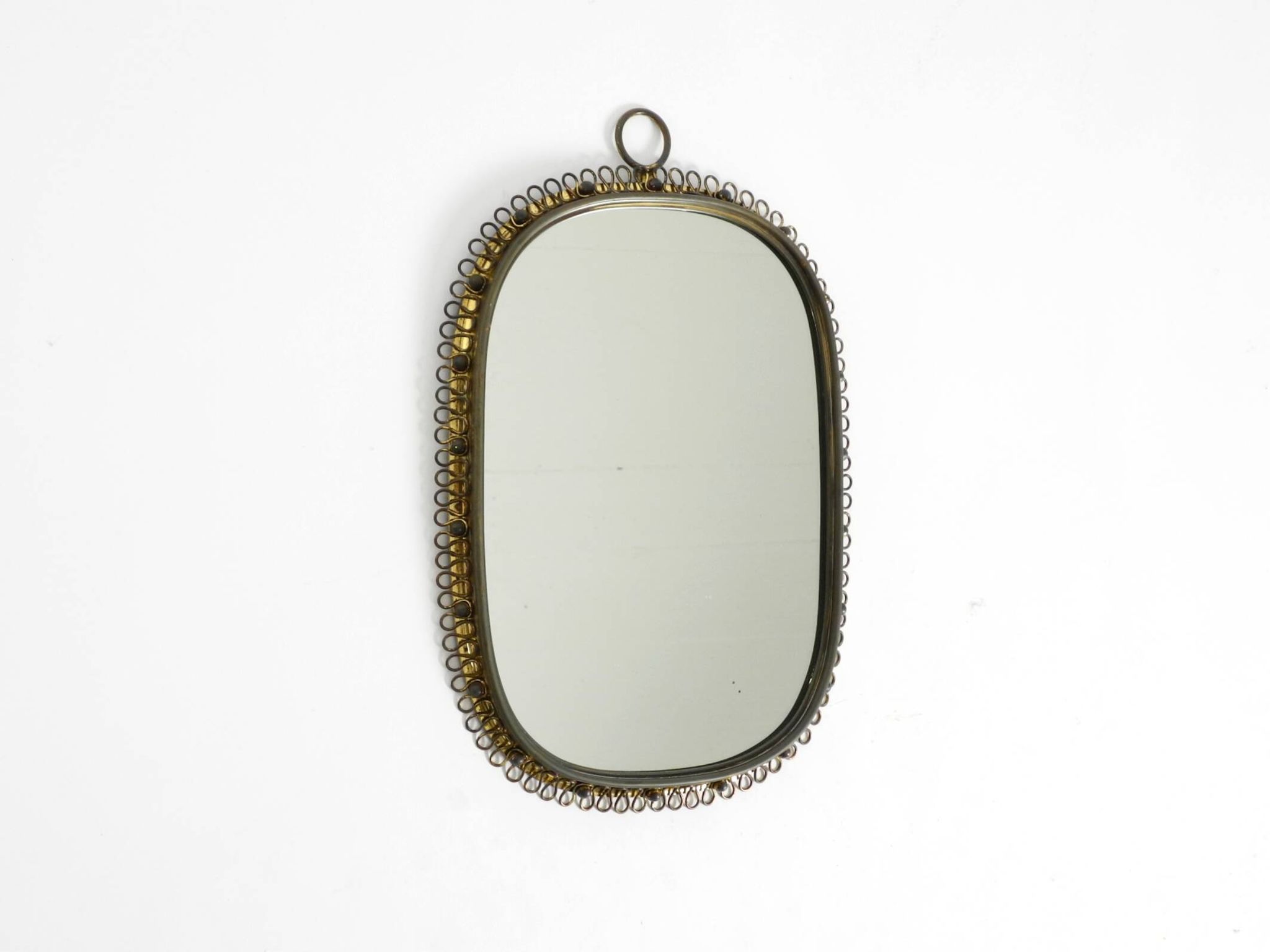 Mid century brass wall mirror by Josef Frank for Svenskt Tenn Sweden