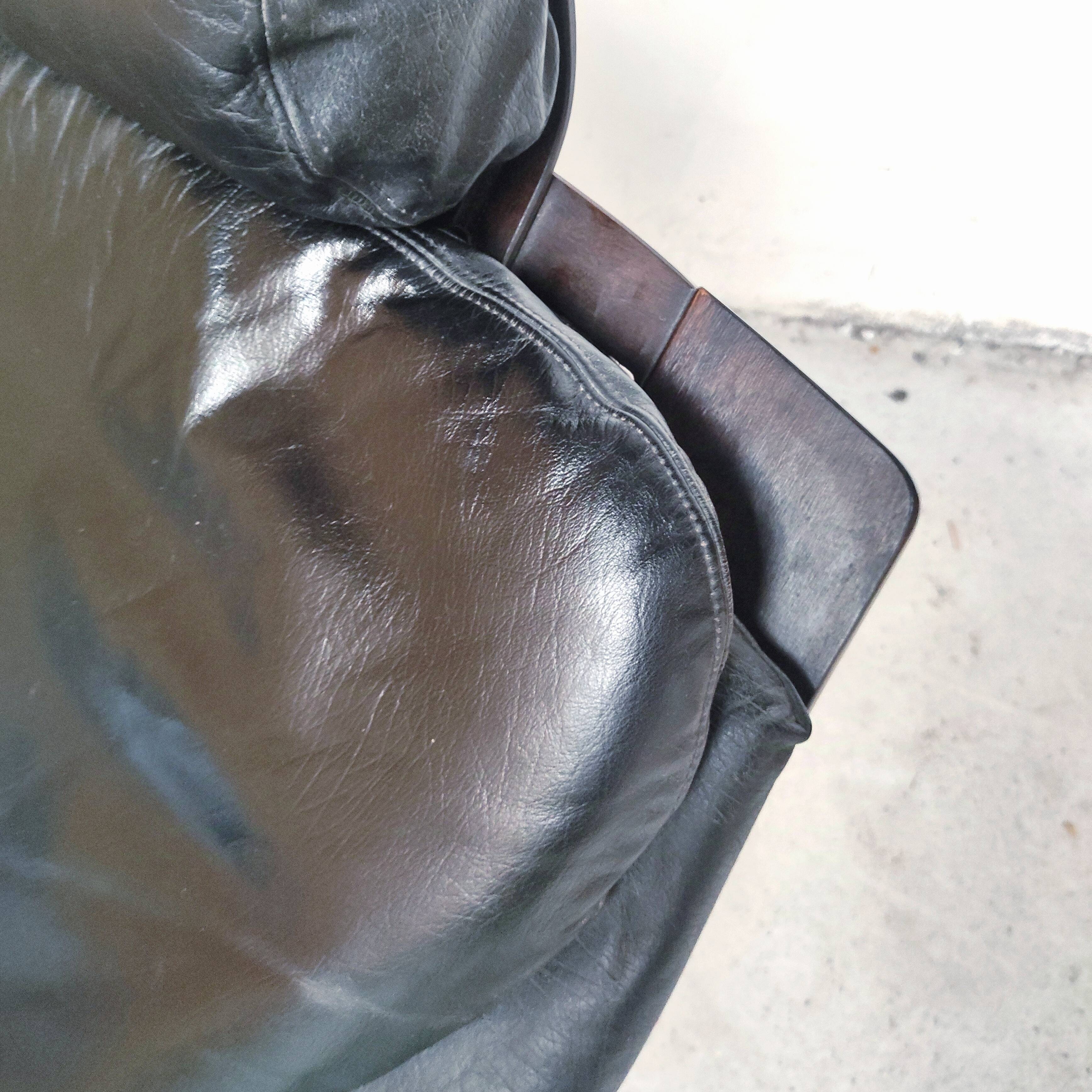 Pair of Kroken armchairs in black leather