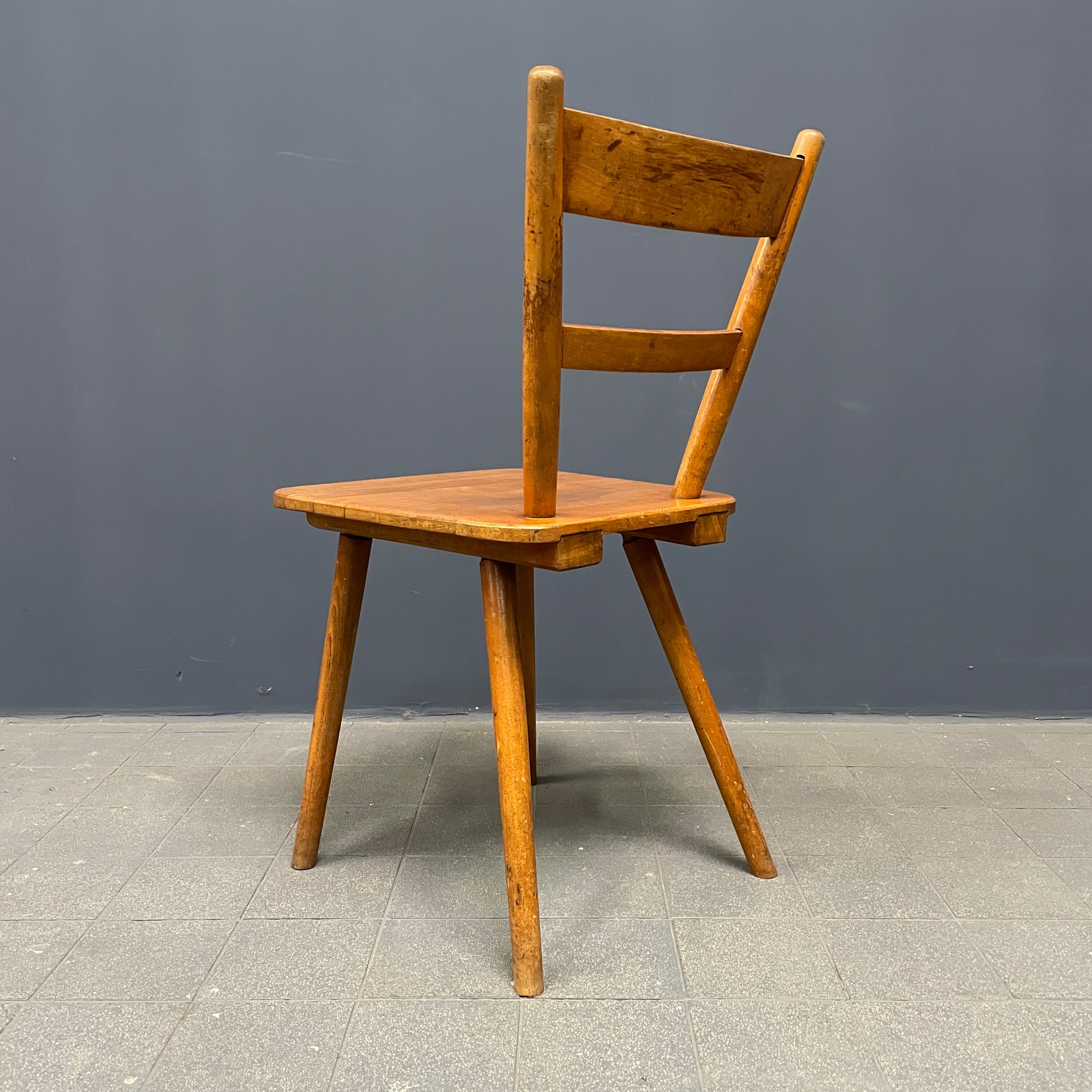 Set of eight german stick chairs from the 1950