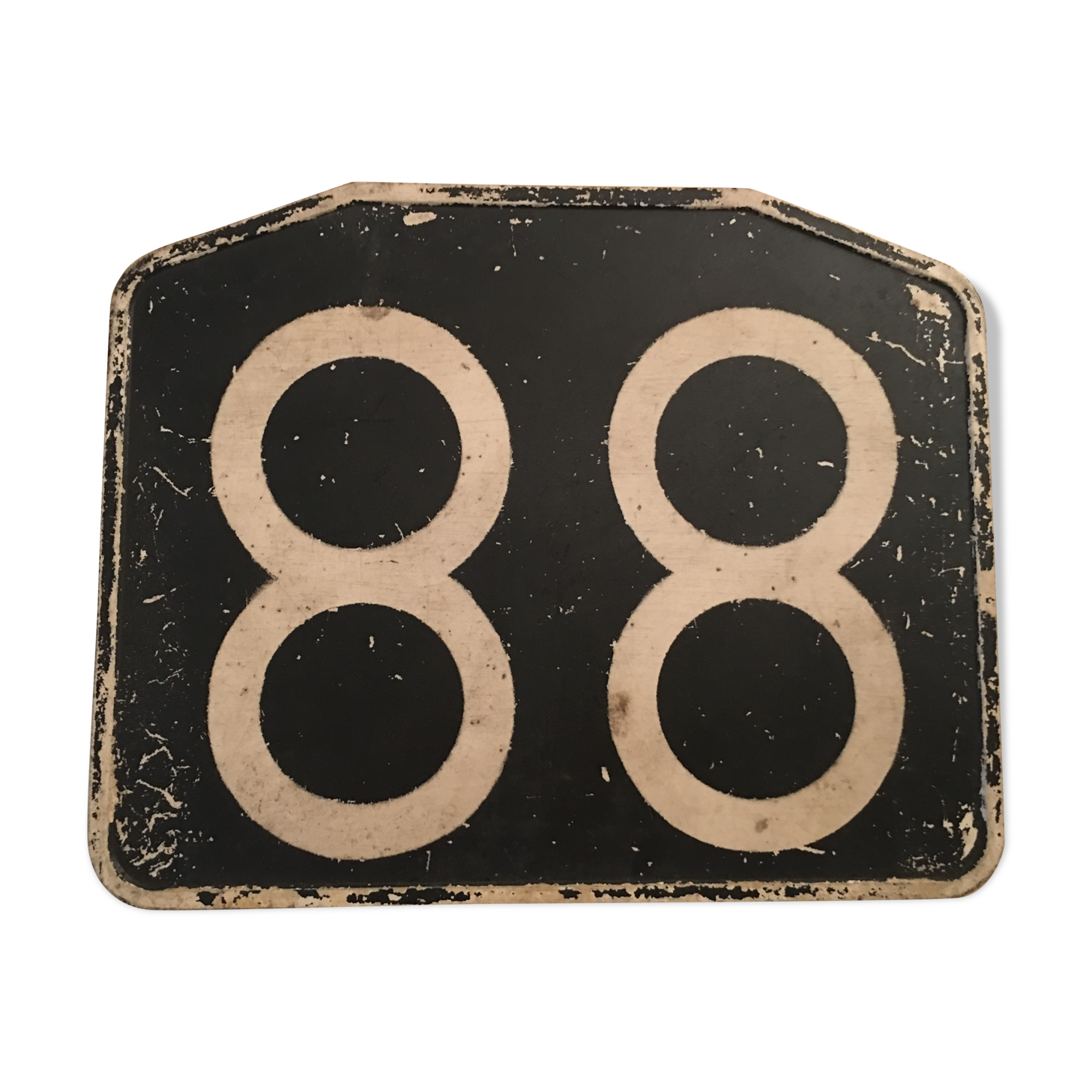 Old Bakelite No. 88 bus line plate.