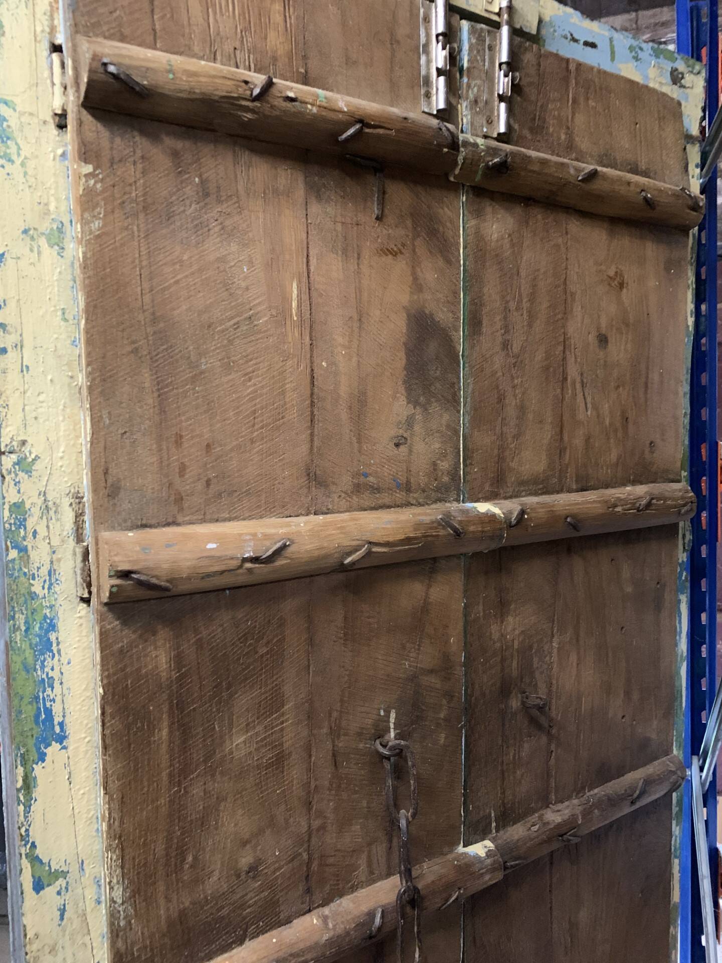 Blue patinated indian door with carved frame