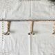 Vintage enameled cast iron wall hook with 3 hooks