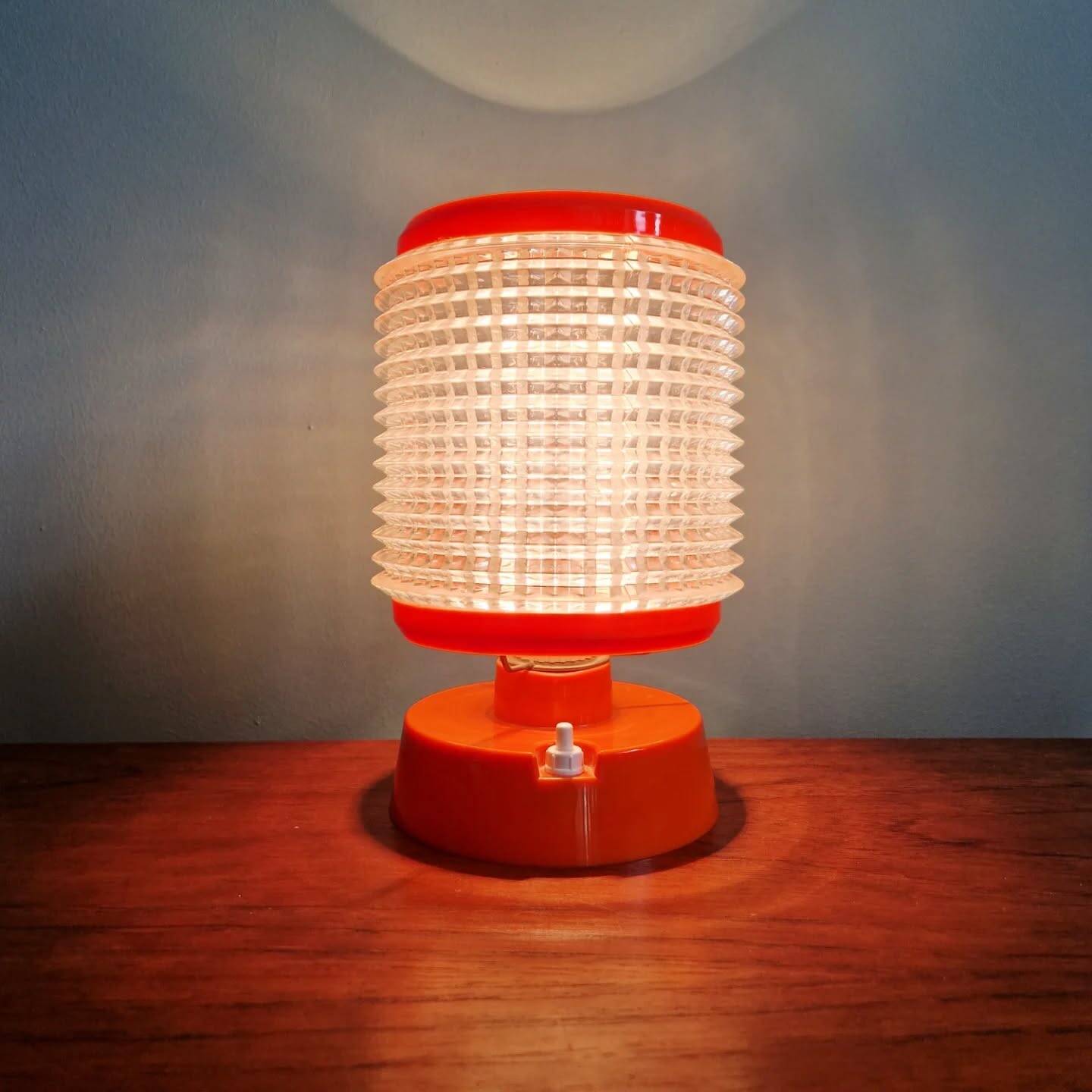 Vintage table lamp in orange and transparent plastic, 1960s.