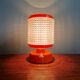 Vintage table lamp in orange and transparent plastic, 1960s.