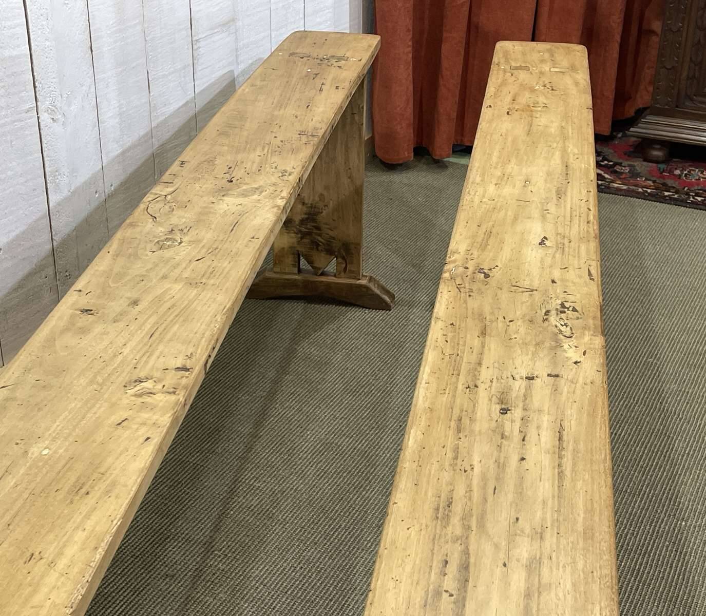 Pair of farmhouse table benches in poplar from the early 20th century.