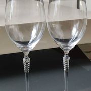 Set of 4 large red wine glasses. With a long twisted stem. Signed Schott Zwiesel. High 27 cm